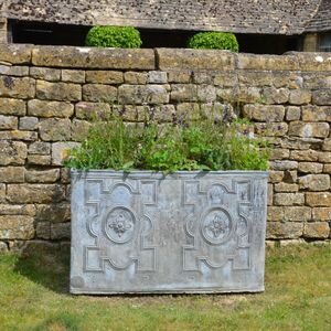 An 18th century lead cistern dated 1771