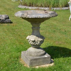 A carved Bath stone planter