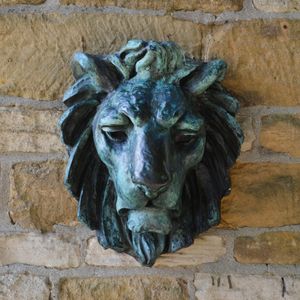 A modern bronze lion mask wall spout 
