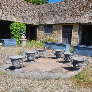 A large pair of lead urns (4 pairs available)