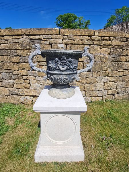 A large pair of lead urns (4 pairs available)
