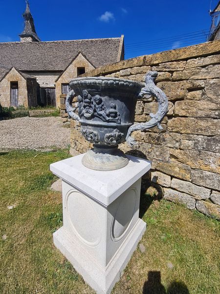 A large pair of lead urns (4 pairs available)