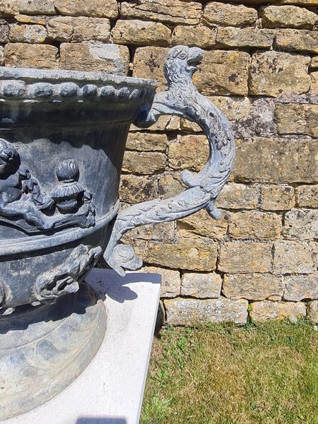 A large pair of lead urns (4 pairs available)
