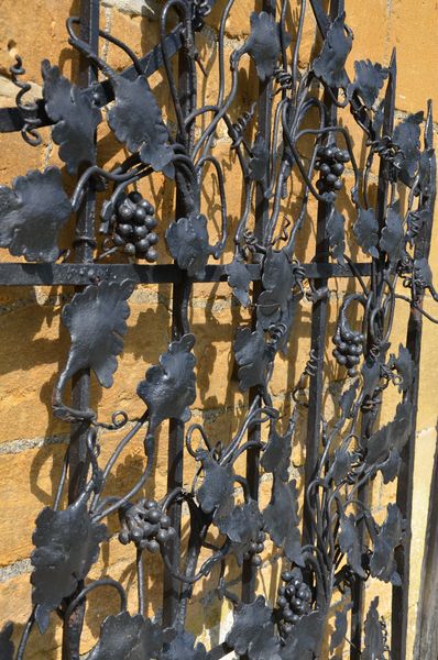 A decorative wrought iron gate