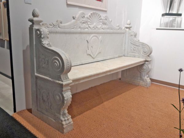 A 19th century Italian carved marble seat 