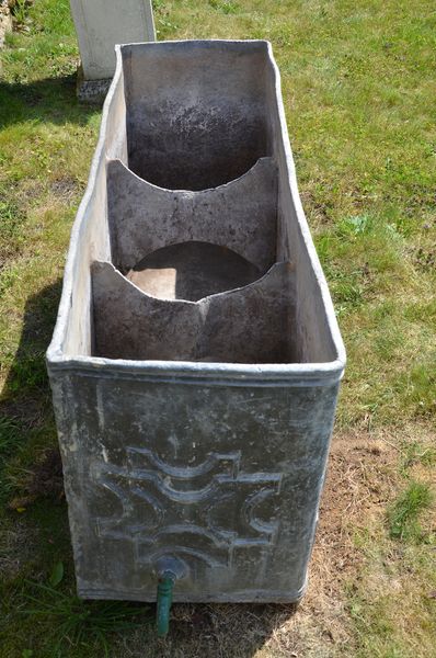 A fine 18th century lead cistern dated 1792