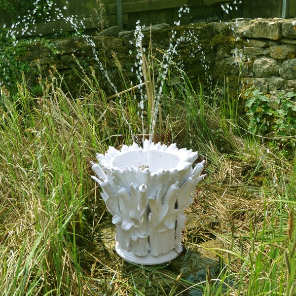 A French 19th century cast iron fountain head  in the form of a collection of bulrushes