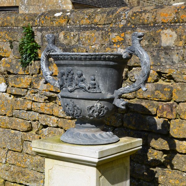 A large pair of lead urns