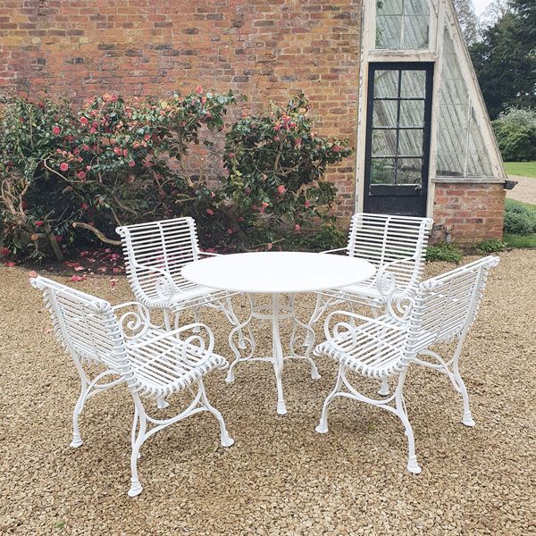 The Large Circular Dining Table with Four Ladderback Carver Garden Chairs