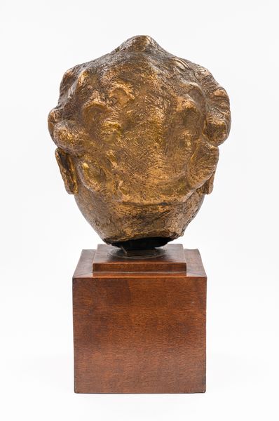 A gilt bronze baby portrait of Kirston Henderson 