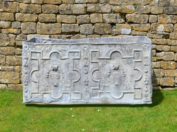 A large 17th century lead cistern dated 1677 from the reign of James II