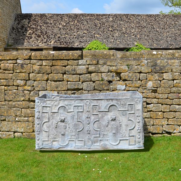 A large 17th century lead cistern dated 1677 from the reign of James II