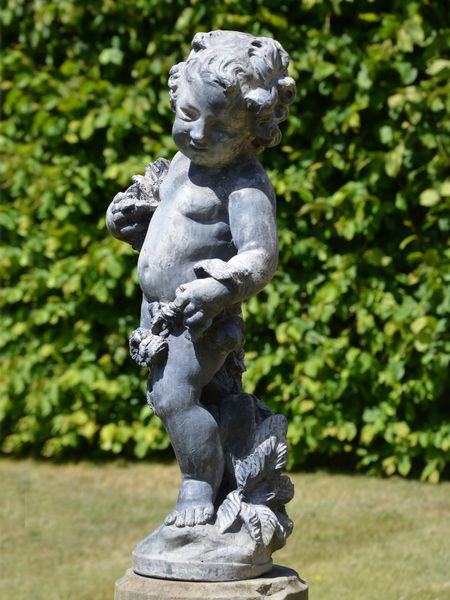 An early 20th century lead figure depicting Summer