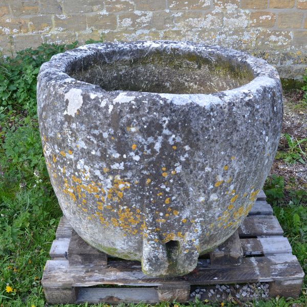 An 18th century circular stone trough