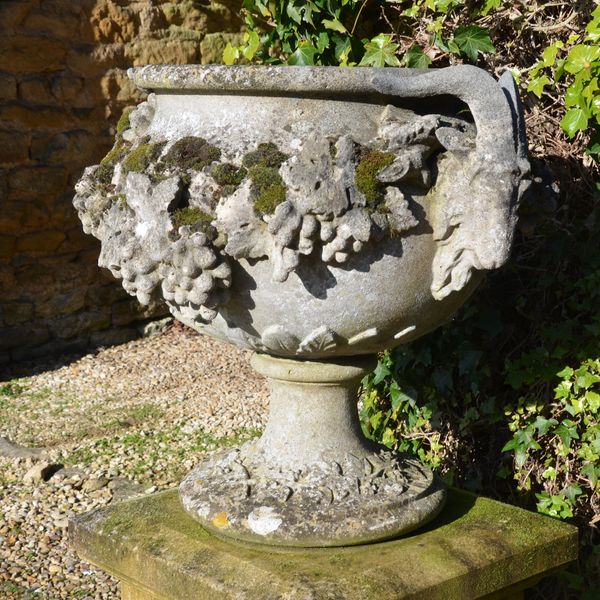 A pair of Austin & Seeley artificial stone urns known as the ‘Adelaide Vase’