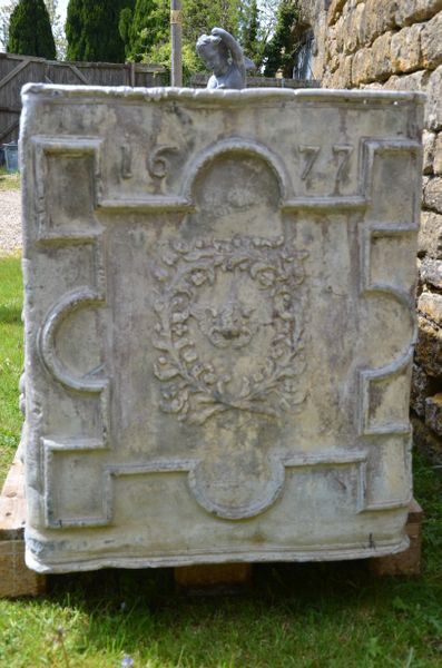 A large 17th century lead cistern dated 1677 from the reign of James II