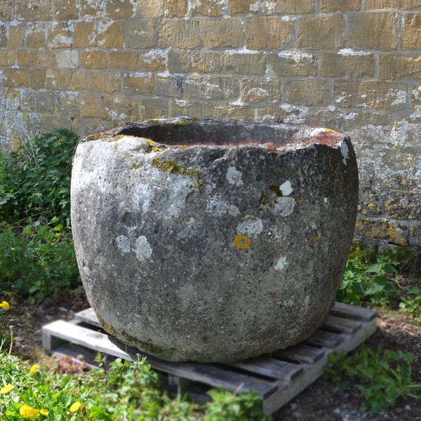 An 18th century circular stone trough