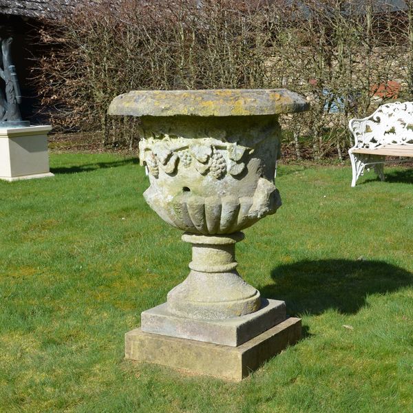 A large mid 19th century carved stone urn 
