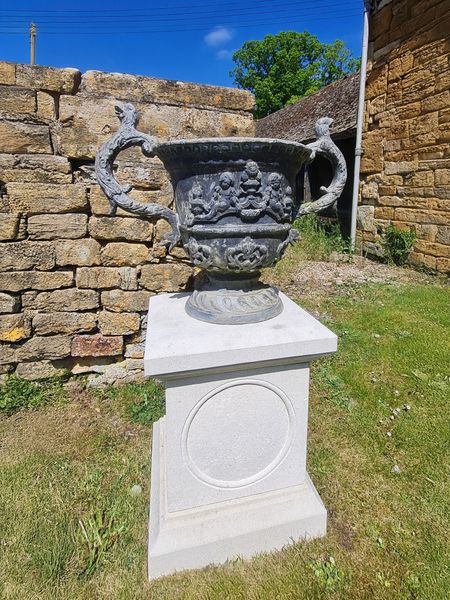 A large pair of lead urns (4 pairs available)