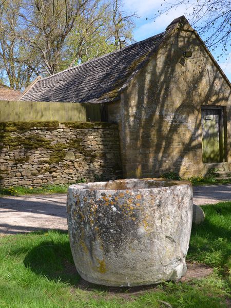 An 18th century circular stone trough