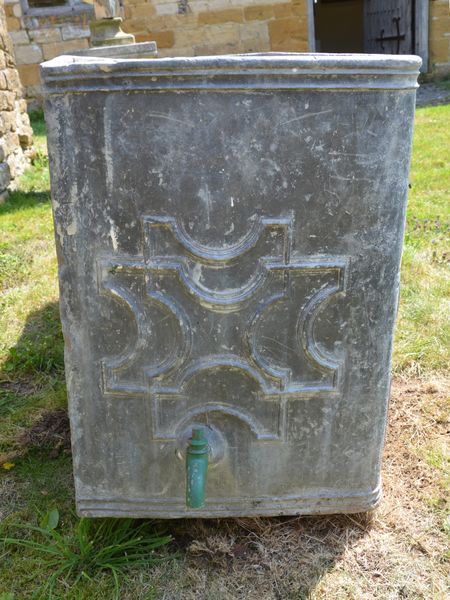 A fine 18th century lead cistern dated 1792