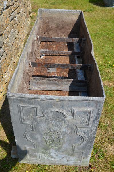 A fine large scale 18th century George II lead cistern dated 1735