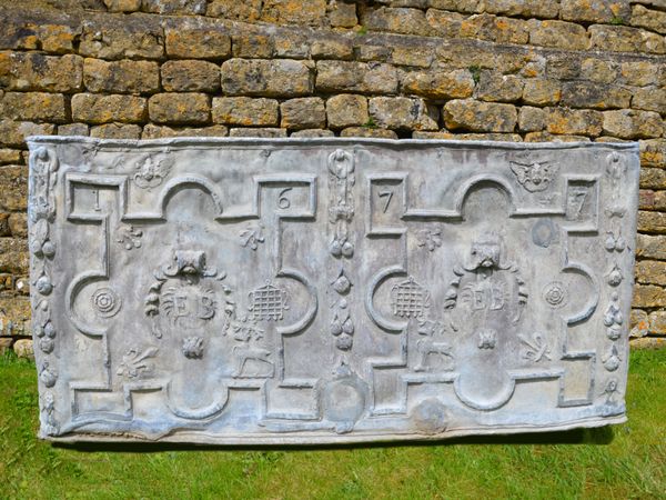 A large 17th century lead cistern dated 1677 from the reign of James II