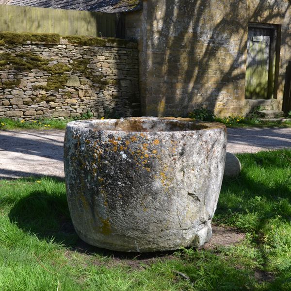 An 18th century circular stone trough