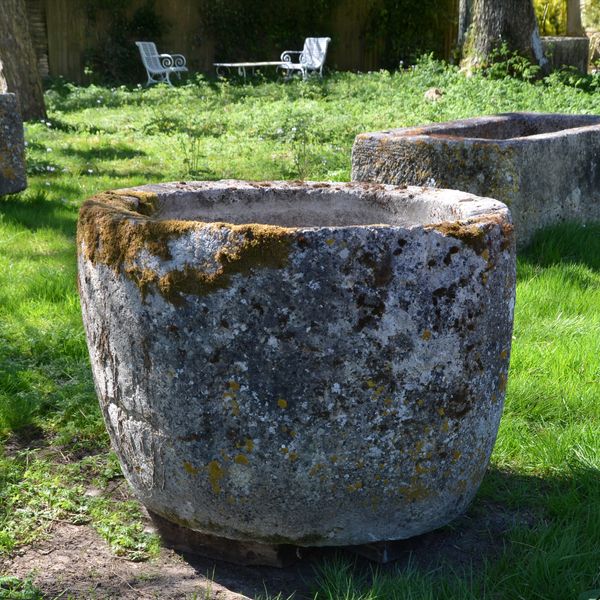 An 18th century circular stone trough