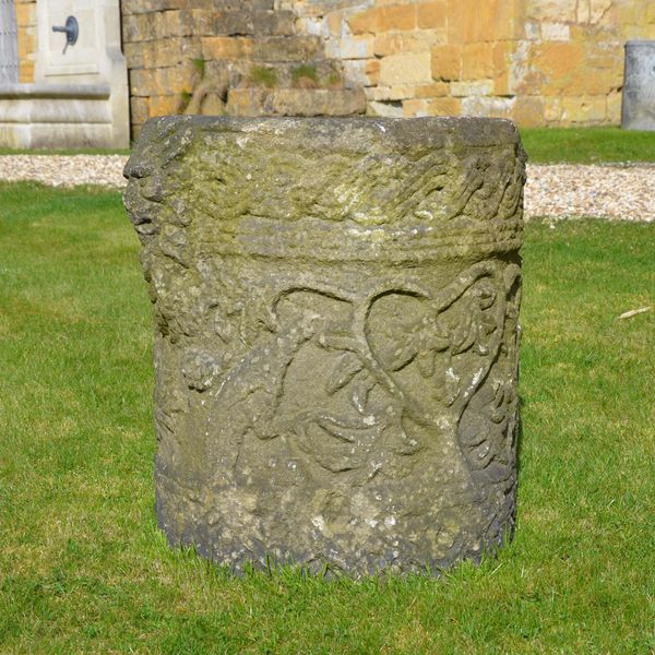 A Romanesque style carved stone planter 