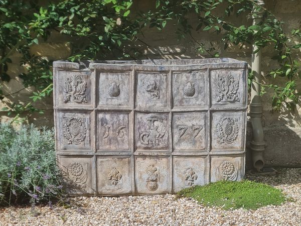 A Carolean lead cistern dated 1677