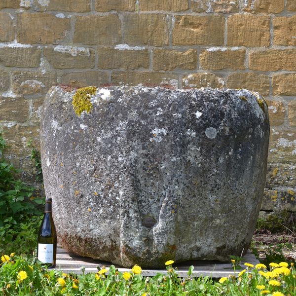 An 18th century circular stone trough