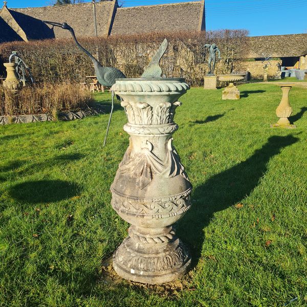 Carved Portland stone sundial with bronze dial plate