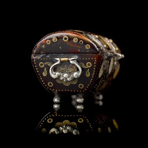 A miniature tortoiseshell casket in the shape of a cassone