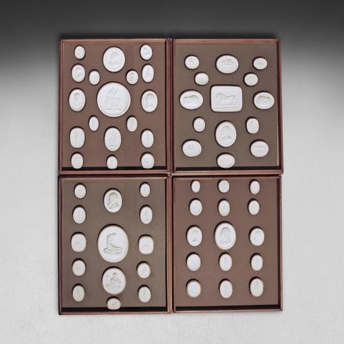 A framed & boxed collection of 61 intaglios / plaster medallions