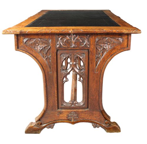 Neo-Gothic carved oak writing table