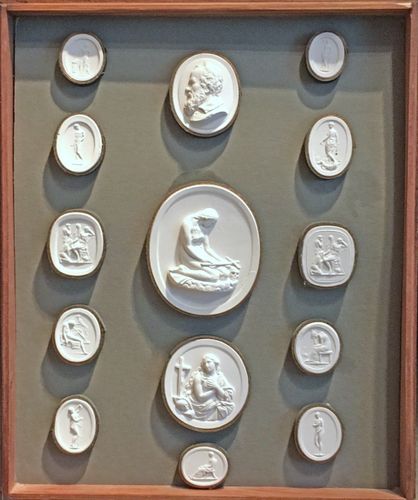 A framed & boxed collection of 61 intaglios / plaster medallions