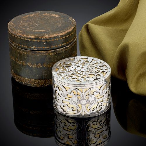 A circular strapwork Box, silver and parcel gilt, Dutch c.1660