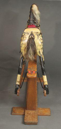 Large rocking horse by Collinson