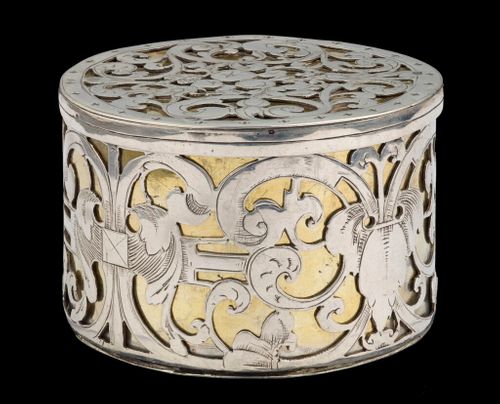 A circular strapwork Box, silver and parcel gilt, Dutch c.1660