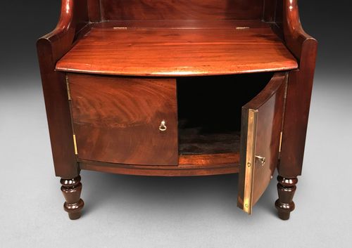 A Very Close Pair Of Regency Mahogany Bedside Cabinets