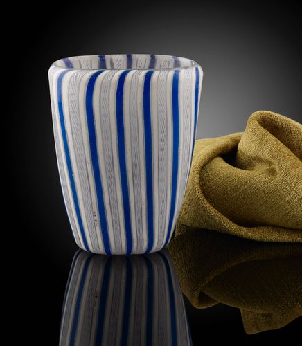 A Glass Beaker with Blue and White Fili and Retortoli; late 17th century.