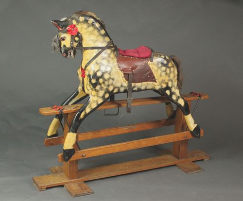 Large rocking horse by Collinson
