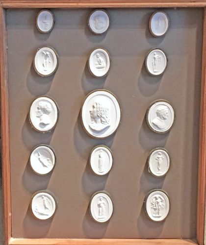 A framed & boxed collection of 61 intaglios / plaster medallions