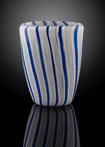 A Glass Beaker with Blue and White Fili and Retortoli; late 17th century.