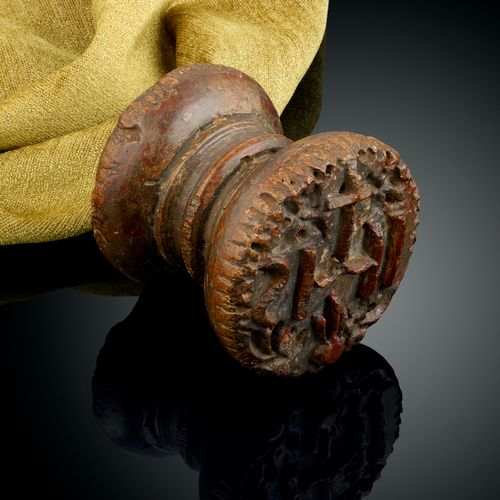 A 17th Century Rare Double Sided Cedarwood Hand Held Stamp