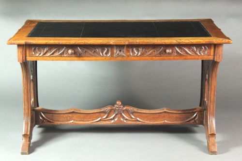 Neo-Gothic carved oak writing table