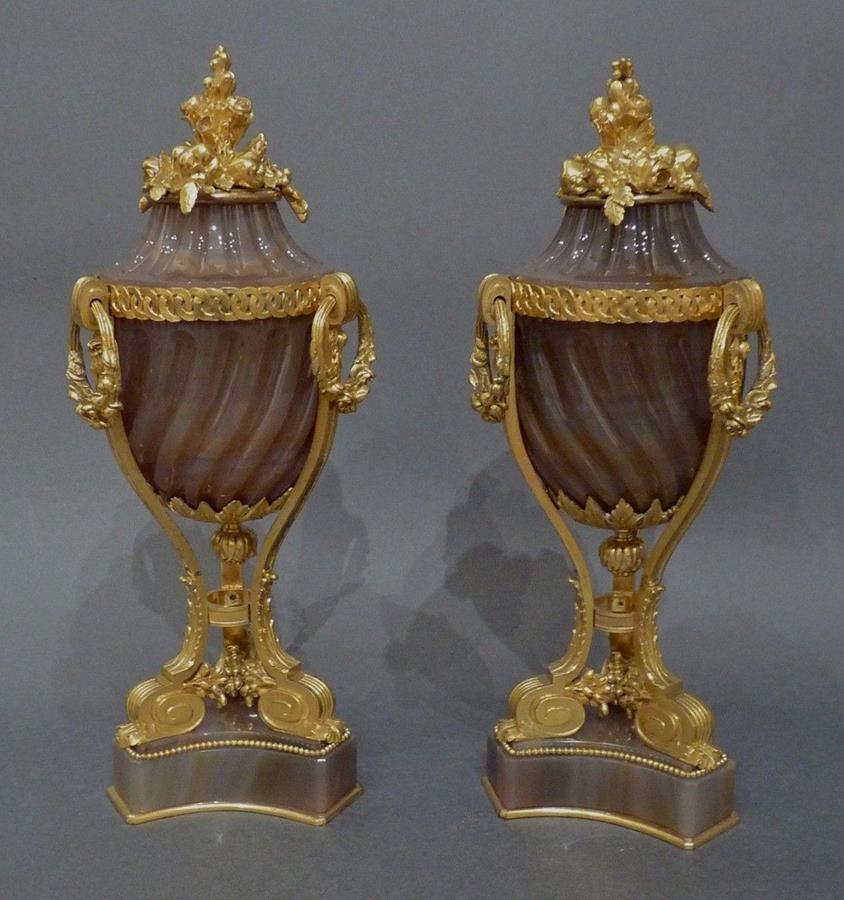 Pair of ormulo mounted agate lidded urns