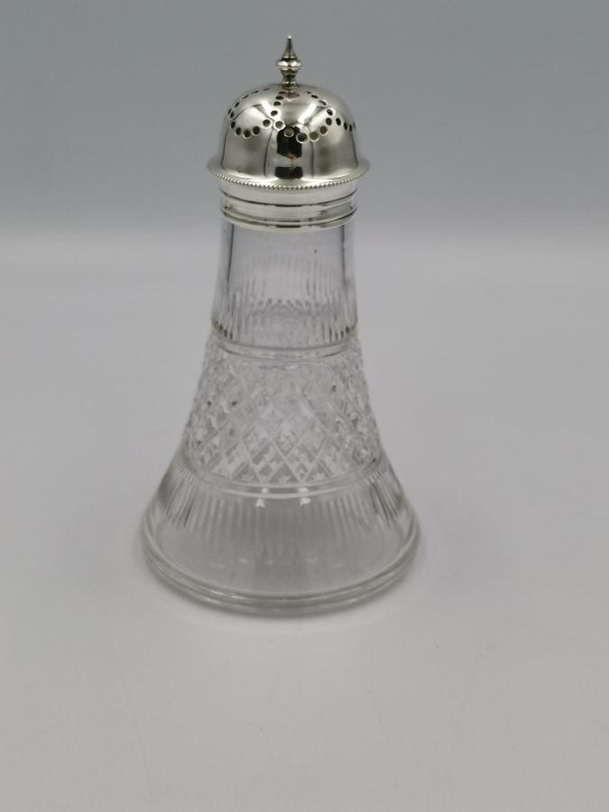 Silver topped cut glass sugar caster