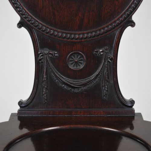 Pair of mahogany Hall Chairs with painted armorials